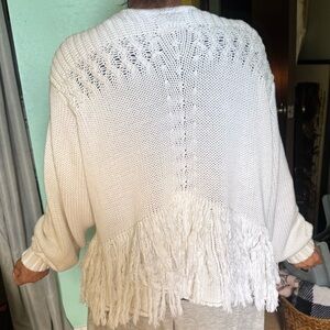 Elegant Cream Cardigan with Fringe Details